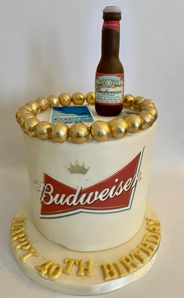 Budweiser beer themed cake with icing fondant scuplture of a beer bottle